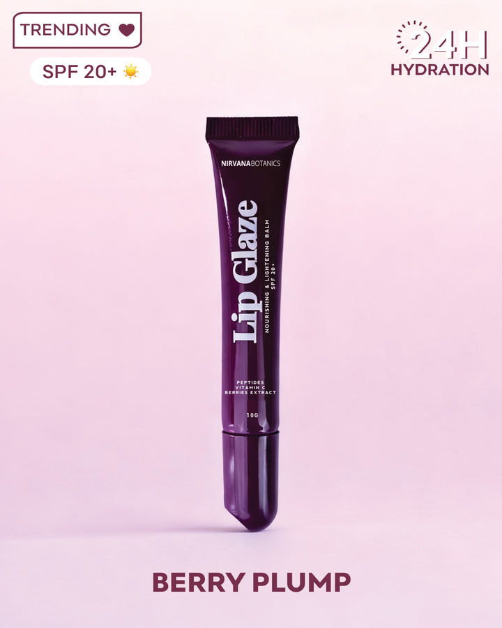 Lip glaze tube labeled 'Berry Plump' on a light purple background