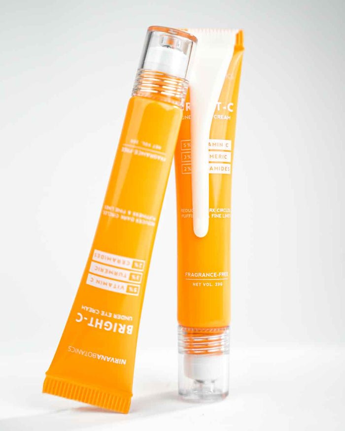 Two skincare products, a tube and a bottle, on a white background