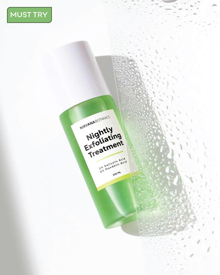 Green and white bottle of 'Nightly Exfoliating Treatment' with droplets on a light background