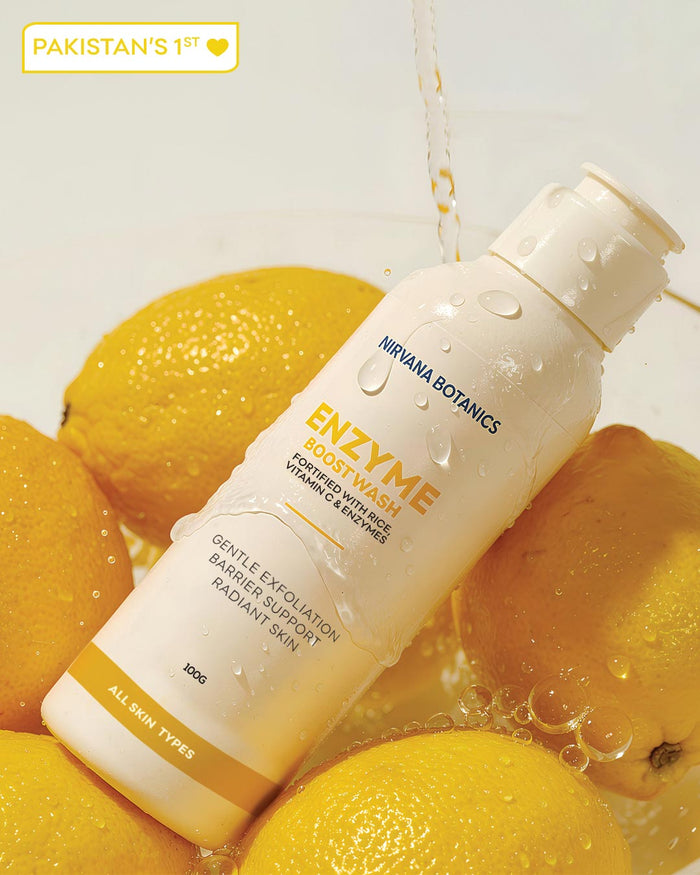 Enzyme powder wash bottle with lemons on a light background