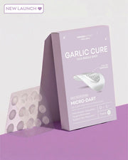 Garlic Cure micro-dart packaging on a purple background